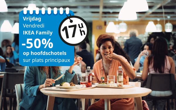 Two women eating at IKEA with communication about a discount on main dishes