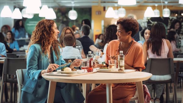 Two women enjoying a meal together