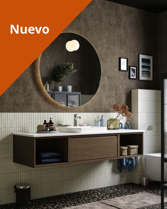 Un baño con un mueble vanitorio flotante y un espejo redondo.