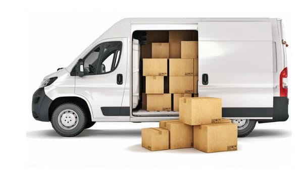 Un furgone bianco del servizio noleggio auto e furgoni con all'interno alcuni scatoloni.