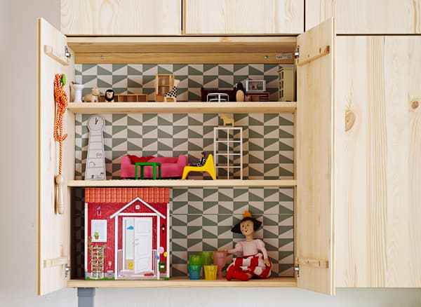 Un mobile IVAR montato alla parete a un'altezza che consente ai bambini di usarlo come casa delle bambole - IKEA