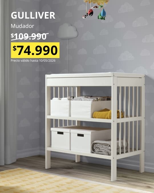 Un mudador blanco GULLIVER con precio especial con cajas organizadas en sus repisas.