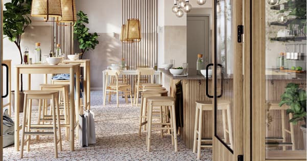 Una sala per il pranzo arredata con tavoli e sgabelli bar RÖNNINGE. 