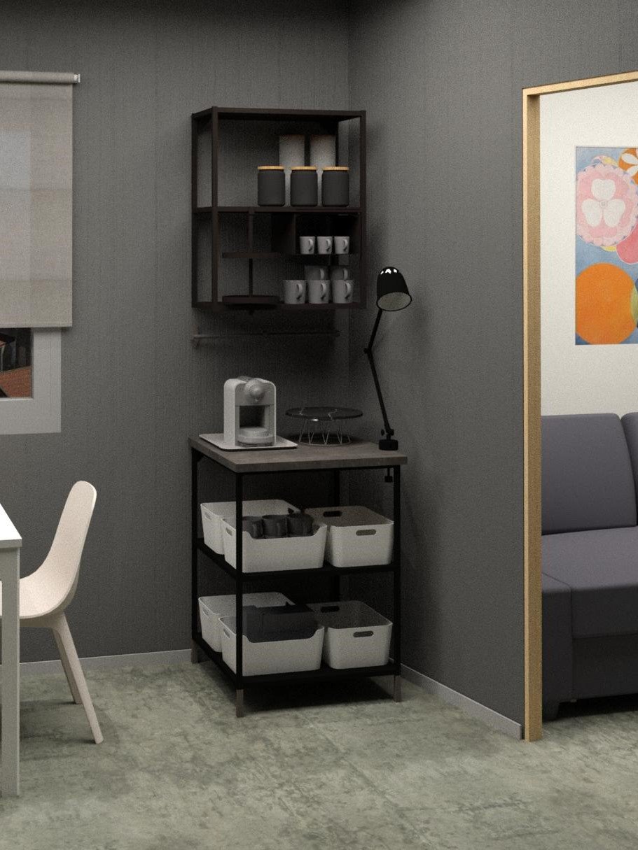 Una soluzione per un angolo da caffè composta da strutture ENHET e piano di lavoro EKBACKEN effetto cemento. Di fronte, un tavolo con una sedia ODGER.