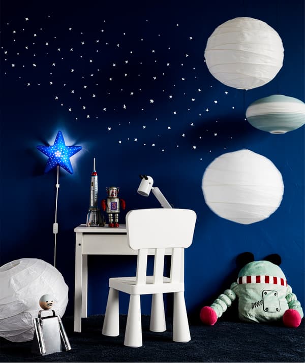 Update the kid’s room with a space-inspired work spot! Furnish with a smart desk such as IKEA SUNDVIK white children’s desk.
