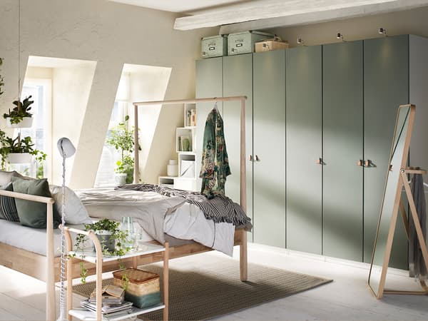 Use natural light and muted tones for a calming bedroom to relax the mind
