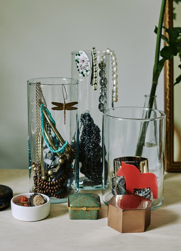 Use vases to store jewellery 