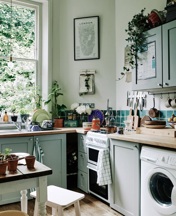 Use wall storage in a compact kitchen 