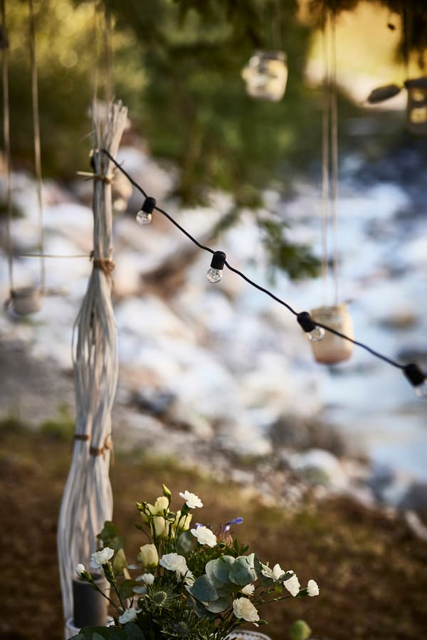 UTSUND LED lights hanging above a table.