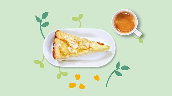 Úvodní foto k lednové aktivitě; Začněte nový rok zdravěji a vyzkoušejte naše bezmasé dobroty. Na obrázku je zdraví dort a espresso na zeleném pozadí.