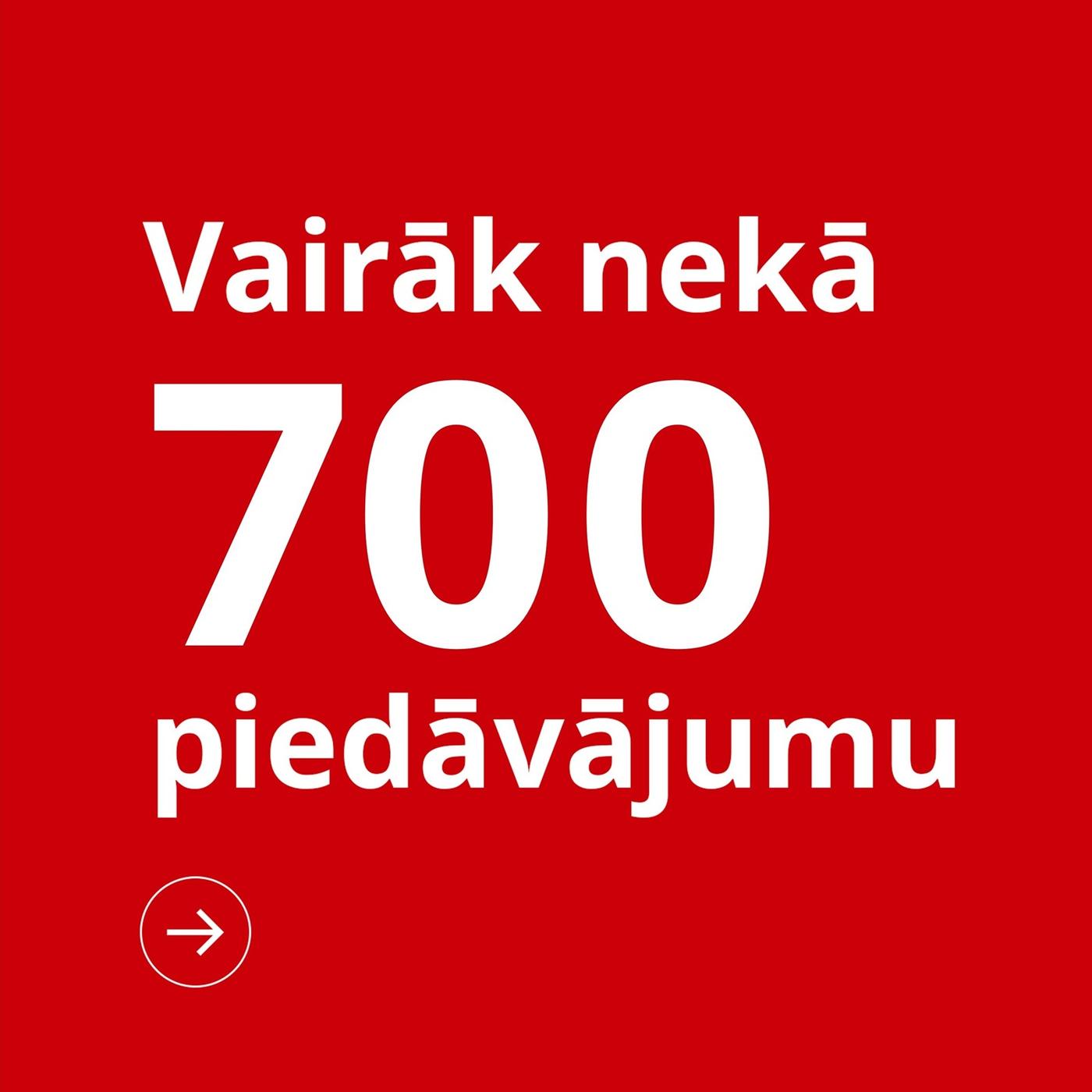 Uz sarkana fona balts uzraksts "Vairāk nekā 700 piedāvājumu.” Zem tā balta bultiņa.    
