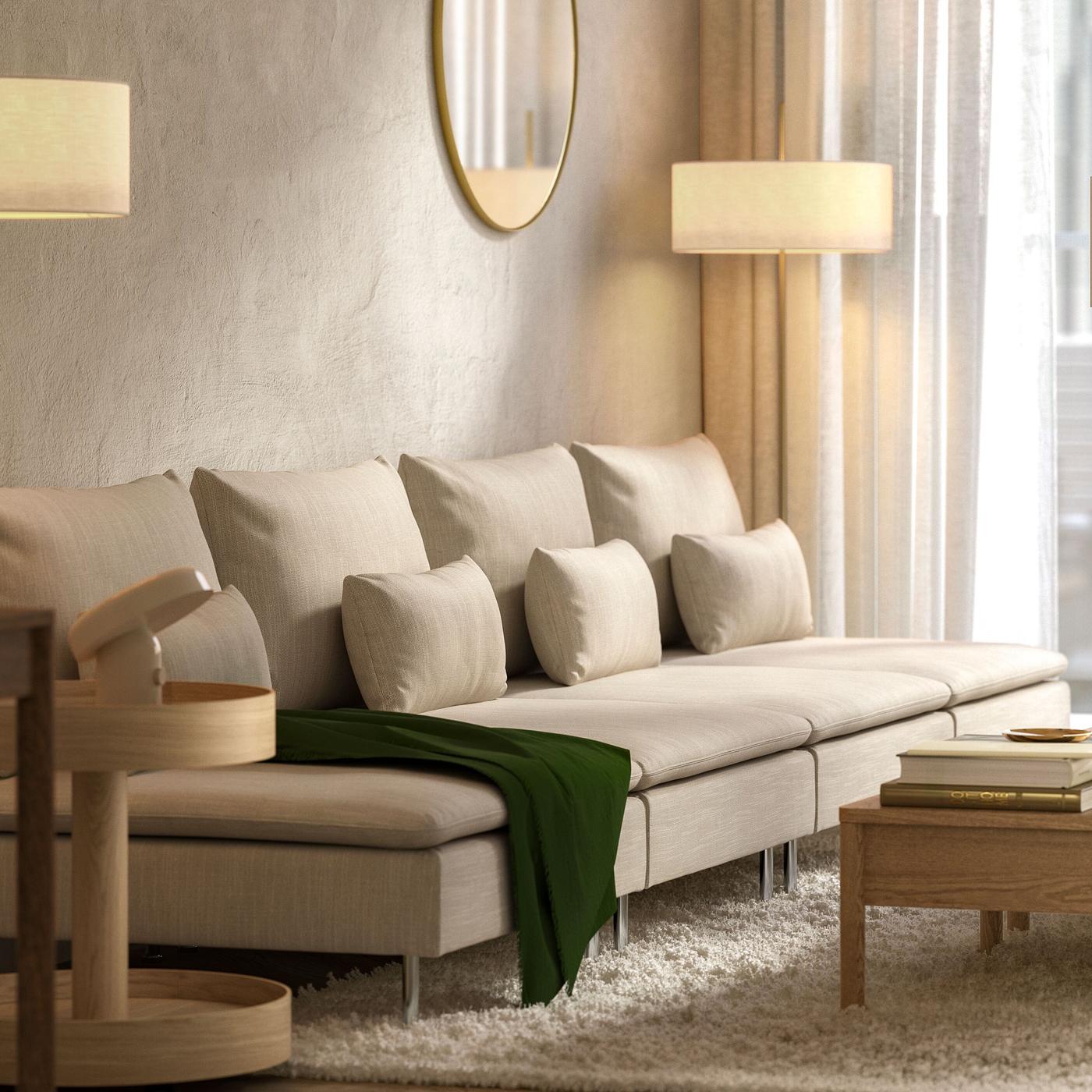 Vaalea ja harmoninen olohuone, jossa on beige SÖDERHMAN-moduulisohva.