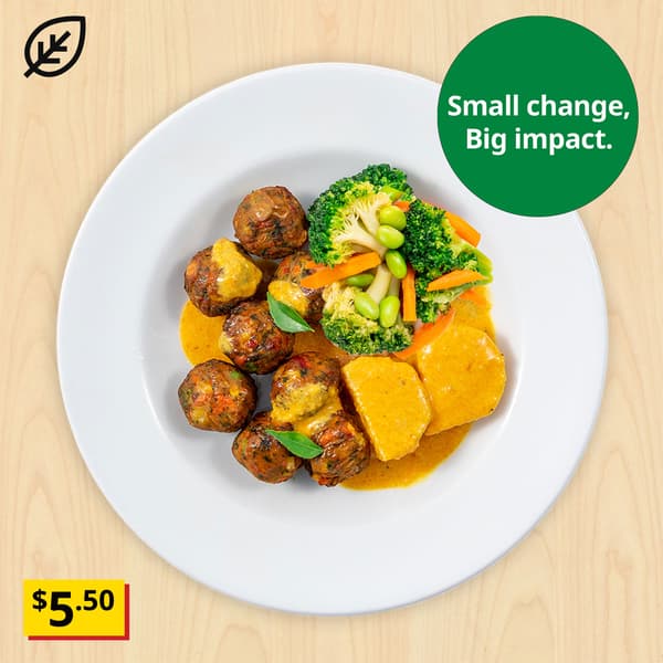 Vegetable balls with mixed vegetables and coconut curry sauce. Plant food symbol at top left corner of thumbnail and sustainability message 