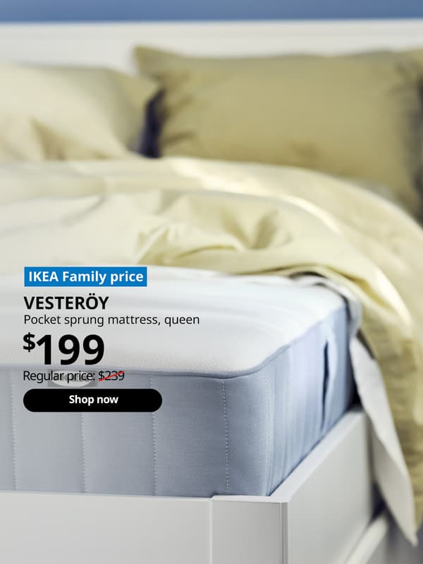 VESTEROY spring mattress in queen size placed on a white MALM bed with pillows and a duvet on top in pastel yellow colours. Words on image "IKEA Family price, VESTEROY, pocket sprung mattress, queen, $199, Regular price: $239 with a slash, shop now". 