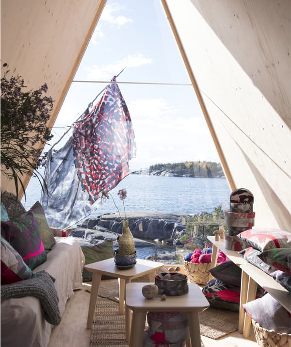 View of the ocean looking out from the lounge area of a hut.
