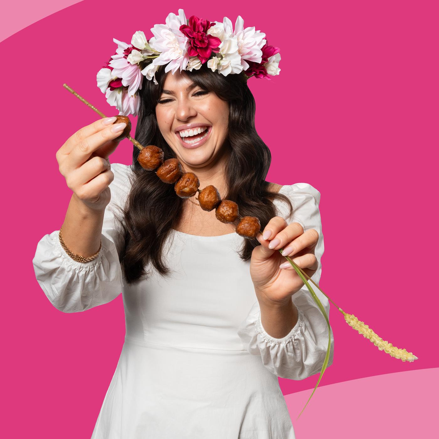 Vrouw met eten in haar hand