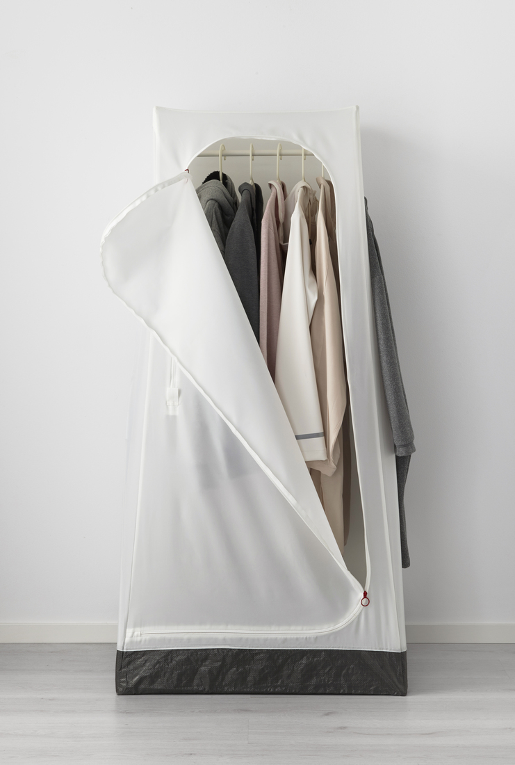 VUKU wardrobe with hanging clothes inside