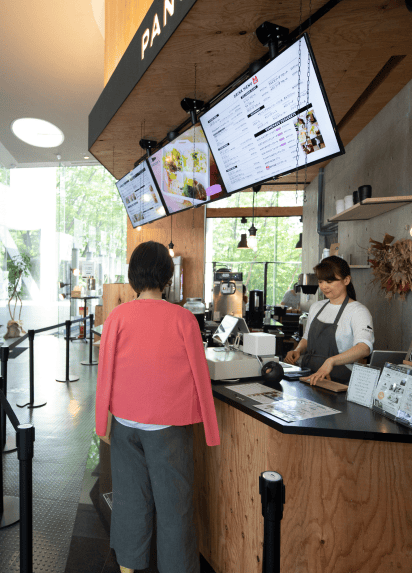 Waitress attending a client