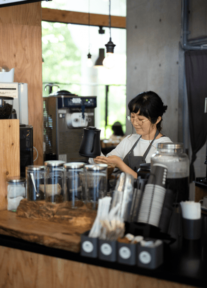 Waitress serving coffe