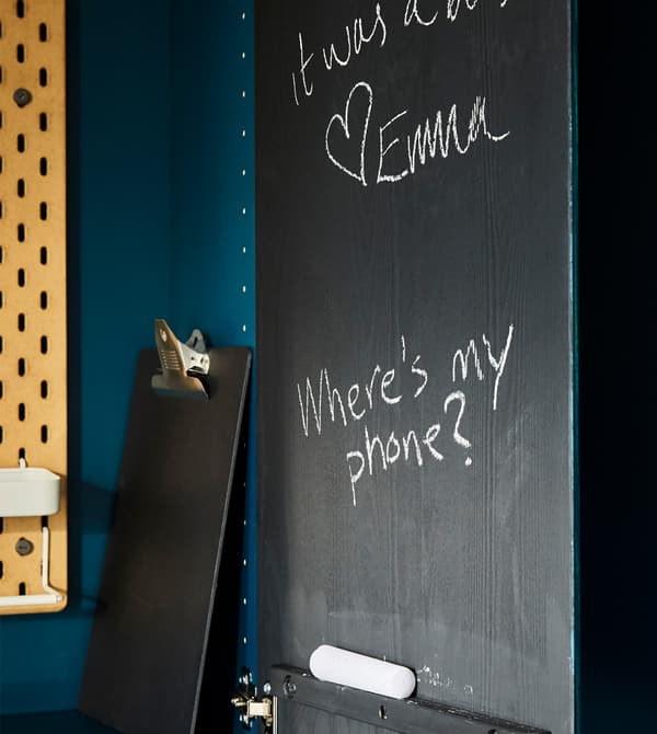 Want a messaging station that isn’t out in the open? Use blackboard paint on the insides of a storage cabinet with doors. IKEA even has MÅLA chalk in a pack of assorted colours.