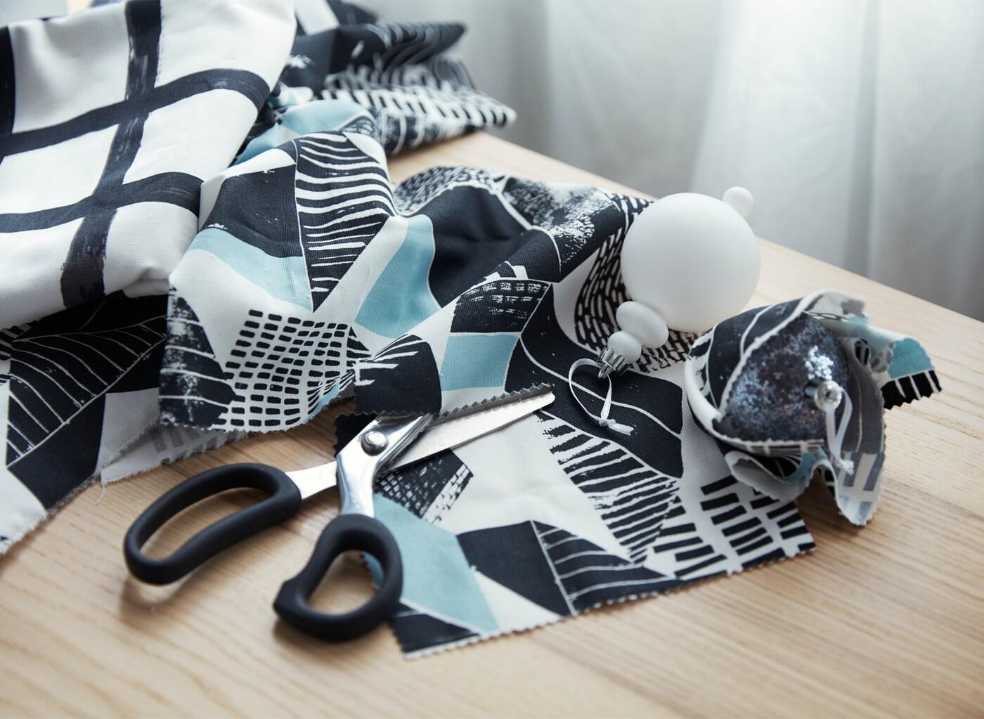 Want some clever storage ideas for all your leads? Avoid a tangled mess by winding them round a waste bin. IKEA has a lot of waste bins such as FNISS in white that holds 10 l or 3 gallons. The product can be recycled or used for energy recovery.