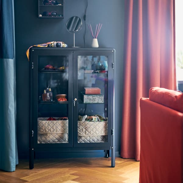 Want to show off AND protect your precious collections? Try IKEA FABRIKÖR black-blue glass-door cabinet!