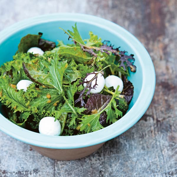 Warm salad with fresh cheese