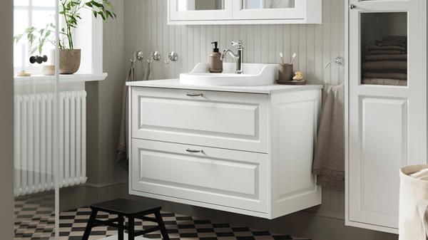 Wastafel met witte lade.