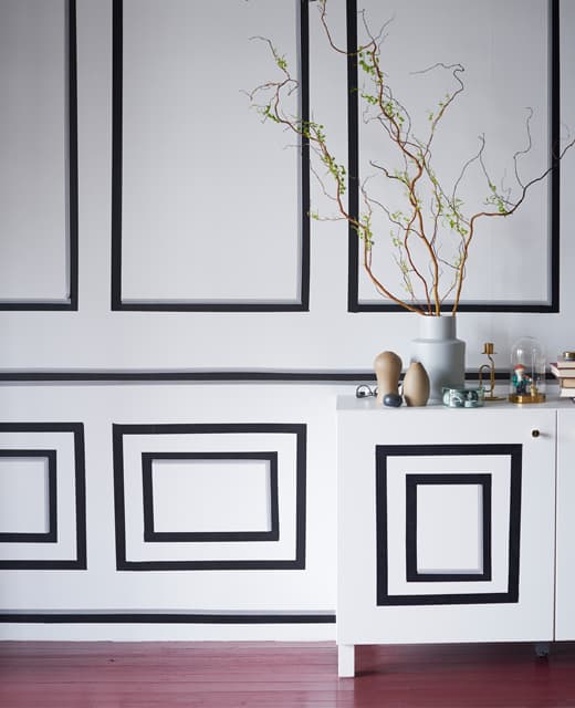 Whatever your thing, you can find affordable furniture tips at IKEA. Decorating a small living room wall with washi tape panels is a great way to do it yourself. Just use IKEA GIVANDE black matt tape that is easy to stick and remove.