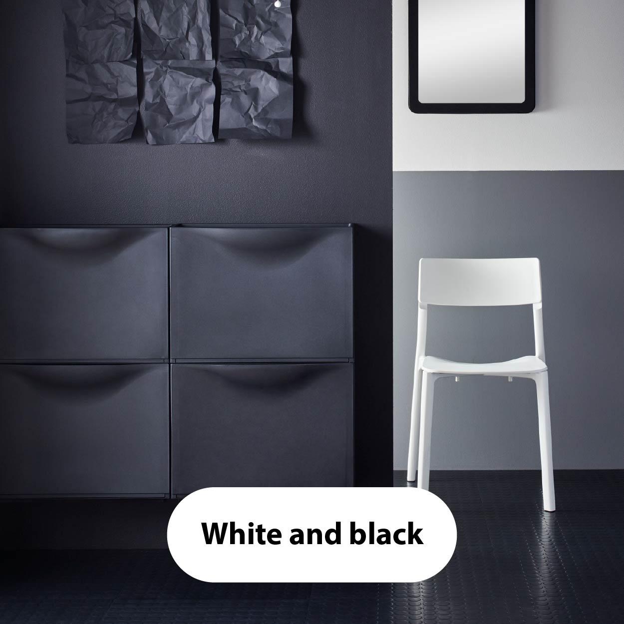 White and black – Minimalist entryway with matte black modular storage units, a single white chair, and a monochrome color scheme.