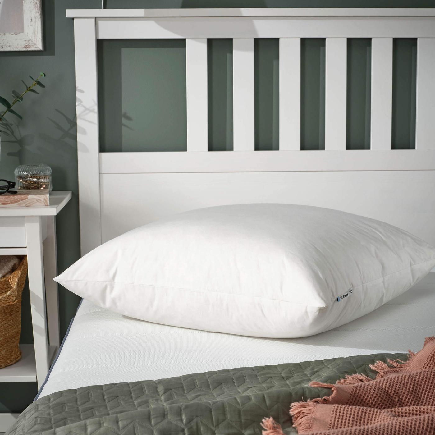 White bed pillow.