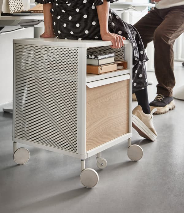 White chest of drawers on wheels