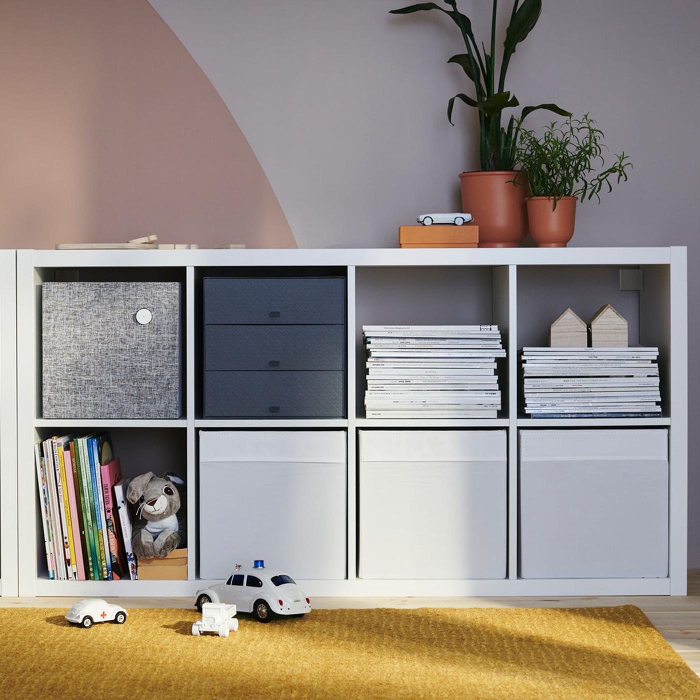 White KALLAX with boxes 