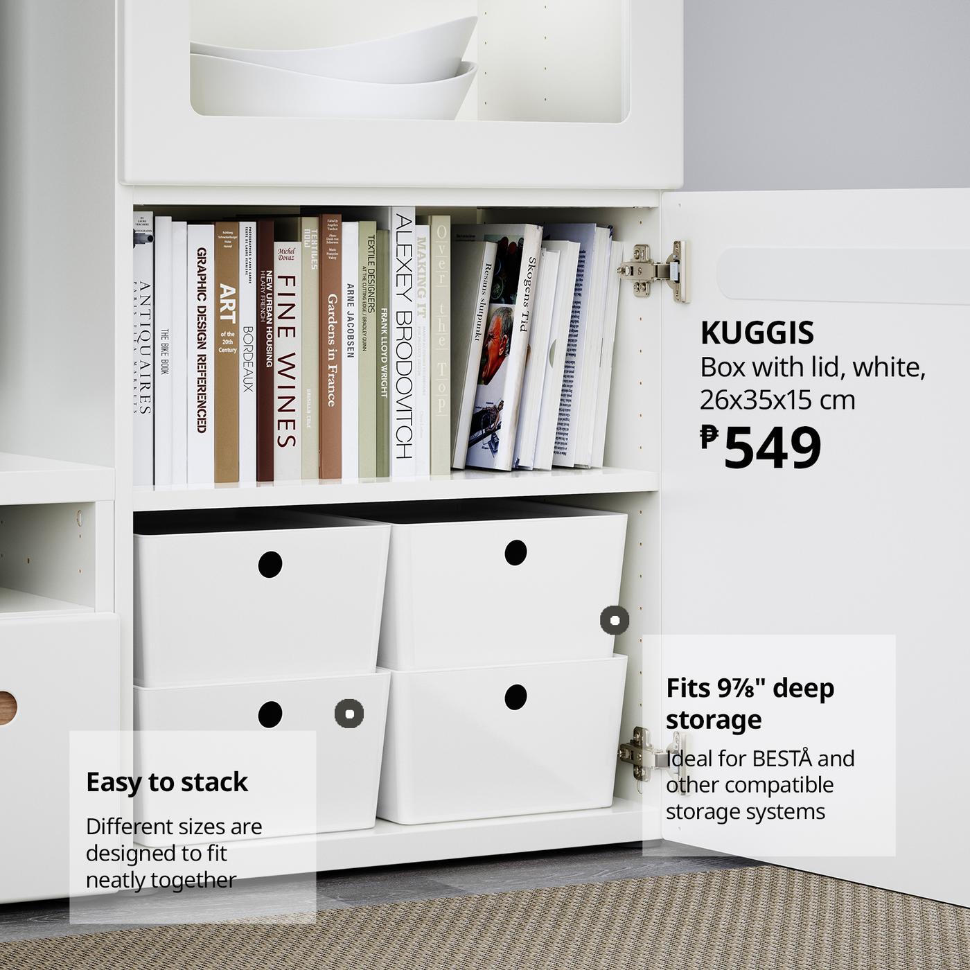 White KUGGIS storage boxes sit beneath books in an open cabinet, creating a neat, minimalist look; ad shows size 26x35x15 cm and ₱549 price.