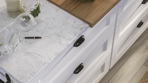 White marble countertop and white drawers below
