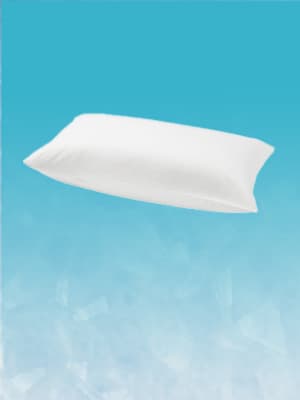White NATTJASMIN pillowcase against an icy blue background, to show its cooling qualities.