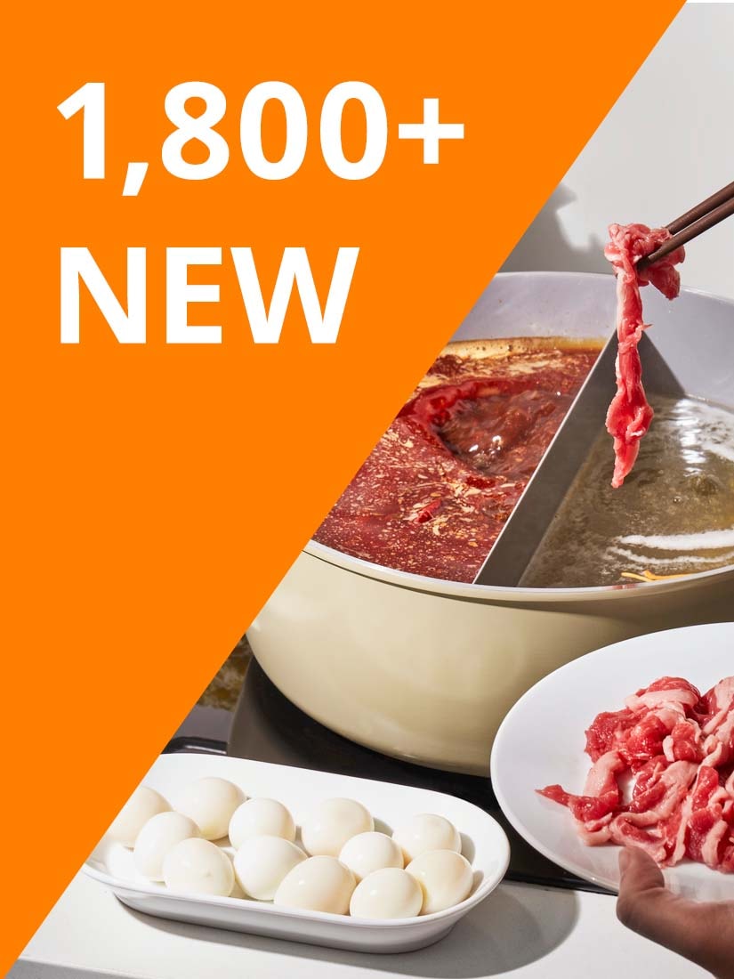 White text reads: "1,800+ NEW" on orange background. Chopstick holding raw meat over SKÄGGTORSK hotpot with divider, filled with soups of two different flavours.