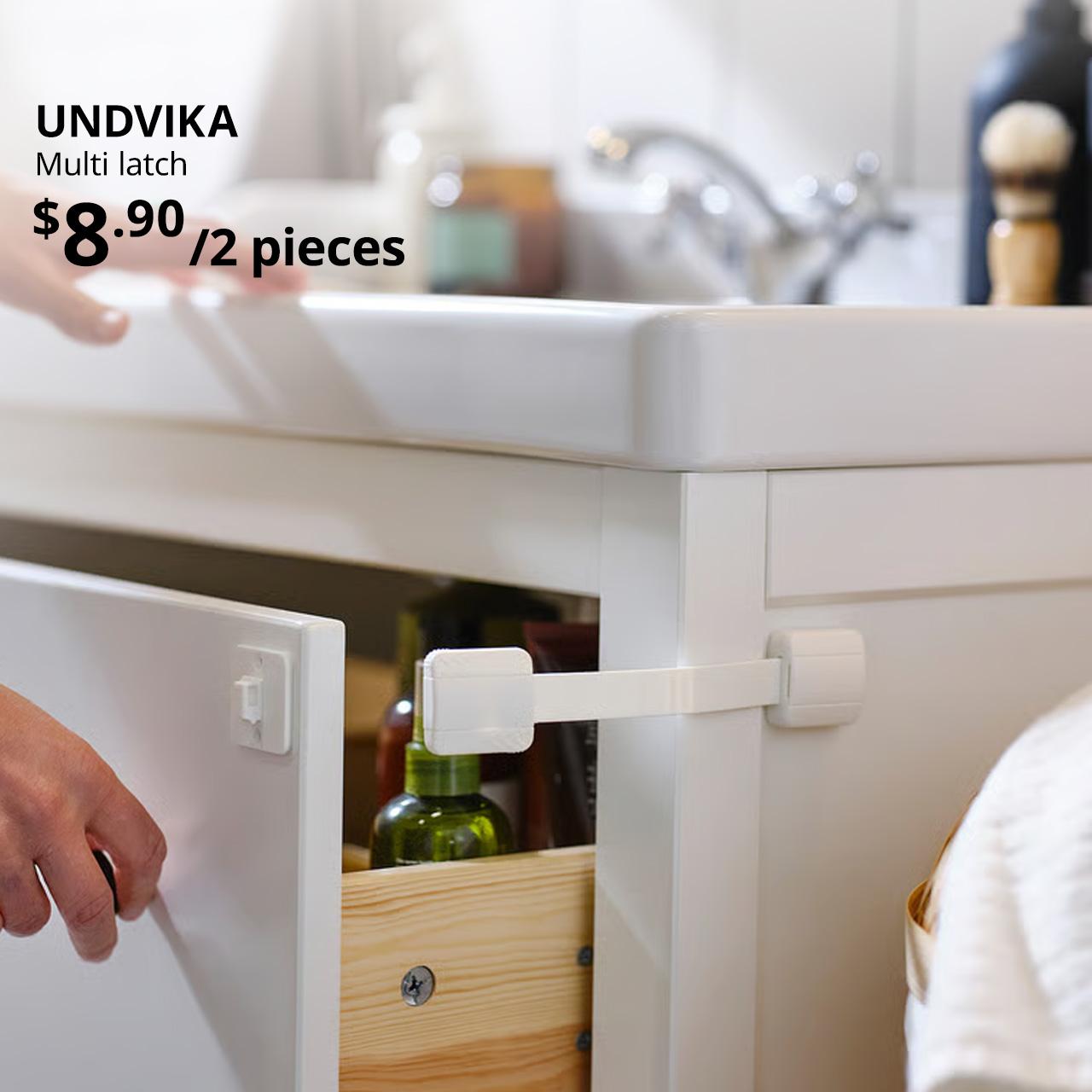 White UNDVIKA multi latch on bathroom vanity cabinet drawer. $8.90/2 pieces