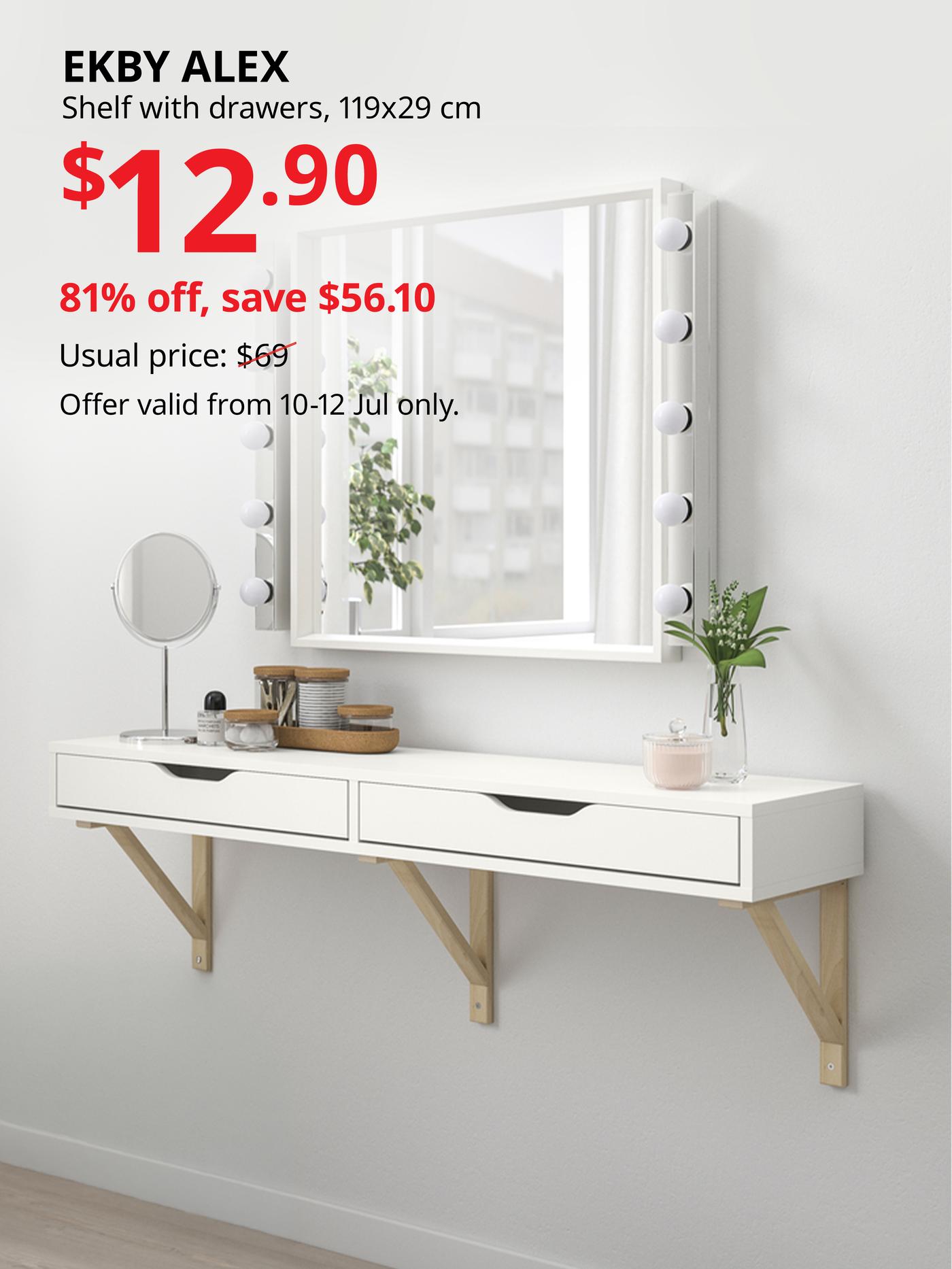 White wall-mounted EKBY ALEX vanity with illuminated mirror and chair in a bright minimalist room.