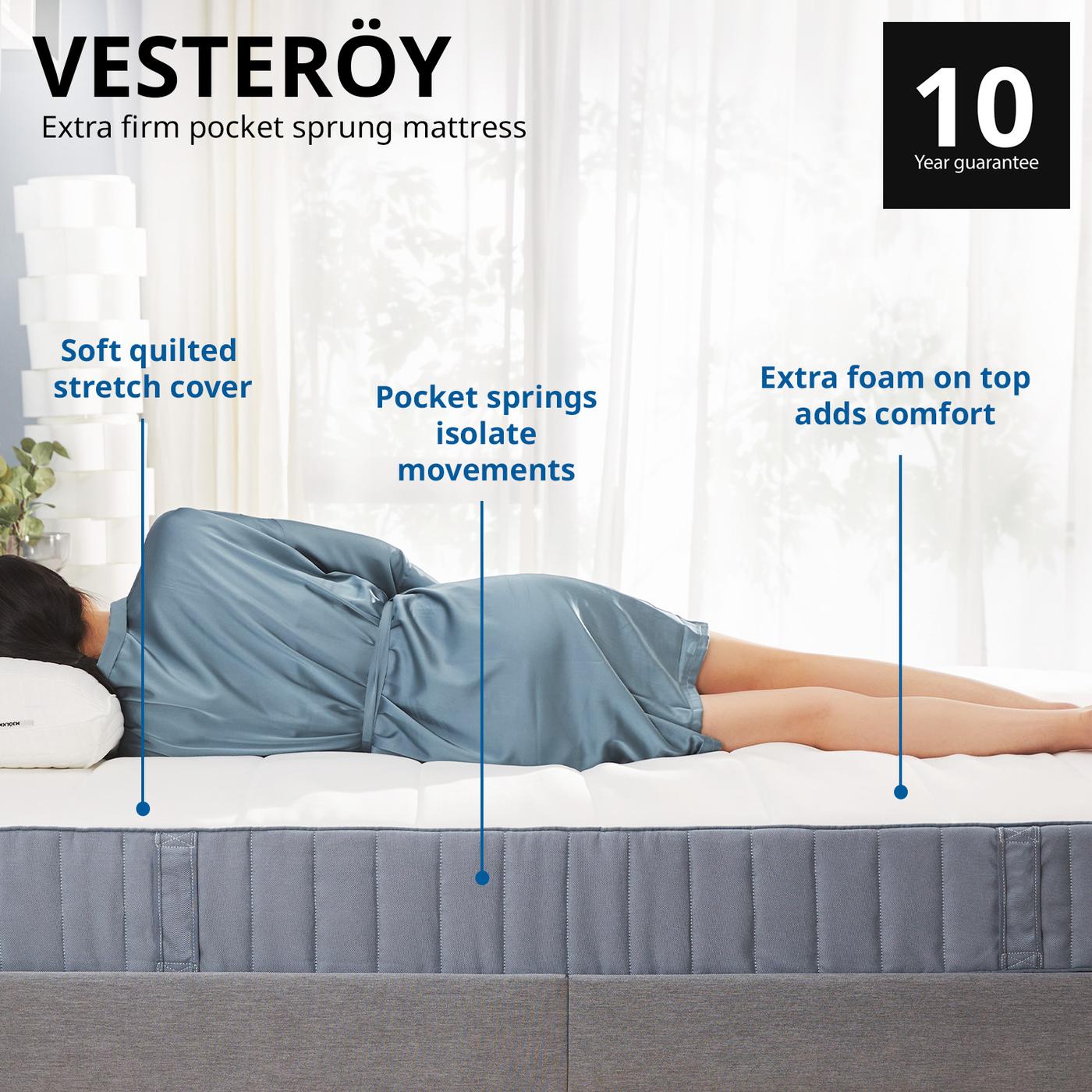 Wide shot of a woman lying sideways on a VESTEROY mattress highlighting the benefits. Comes with 10 year guarantee.