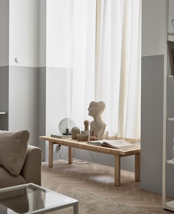Window curtains don’t need to reach down to the floor. Hem yours shorter for a fresh look.