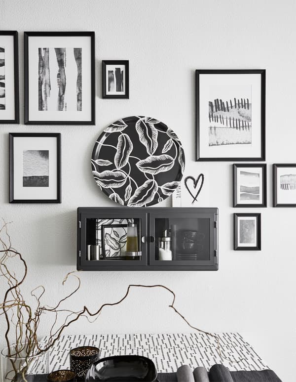 With some pictures and tone-on-tone serveware, your kitchen is easily given a new look. It’s a great way to update a kitchen on a budget.