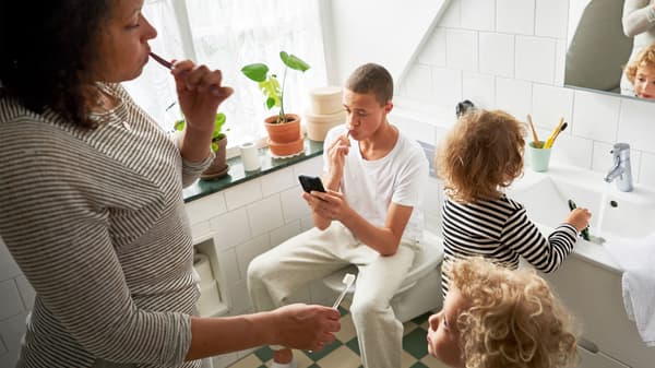 Woman and kids in bathroom