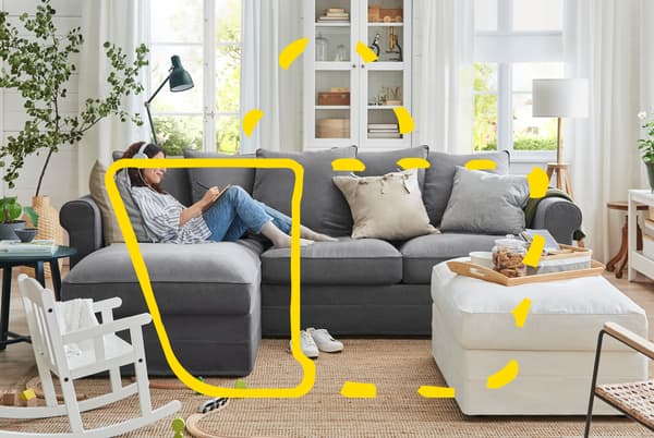 Woman on couch with a tablet