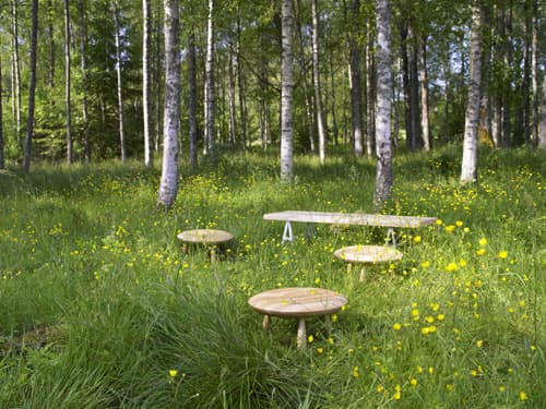 Wood tables in field