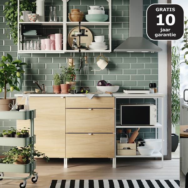 wooden kitchen with many open cabinets and shelves 
