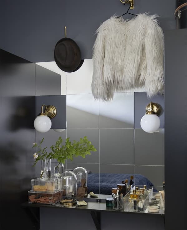 You can use lots of smaller mirrors like LOTS mirror from IKEA to make big wall mirrors. The 30-cm square mirrors come in a four-pack with double-stick tape for easy set-up.