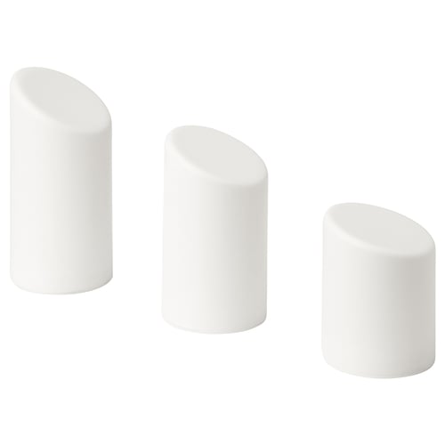 Three white cylindrical led candles, each with a sloped top, arranged in a row. Modern and minimalist design for indoor/outdoor use.