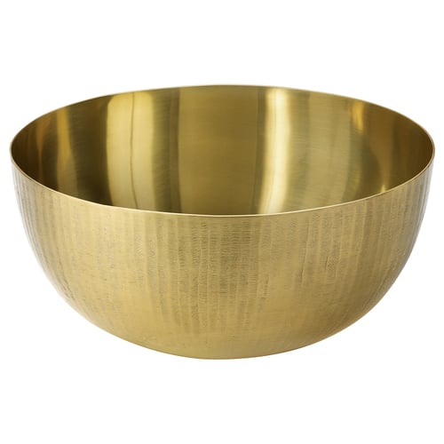 The AROMATISK bowl is a golden metallic, round, chiselled-edged vessel with a gleaming interior, perfect for both decoration and utility.