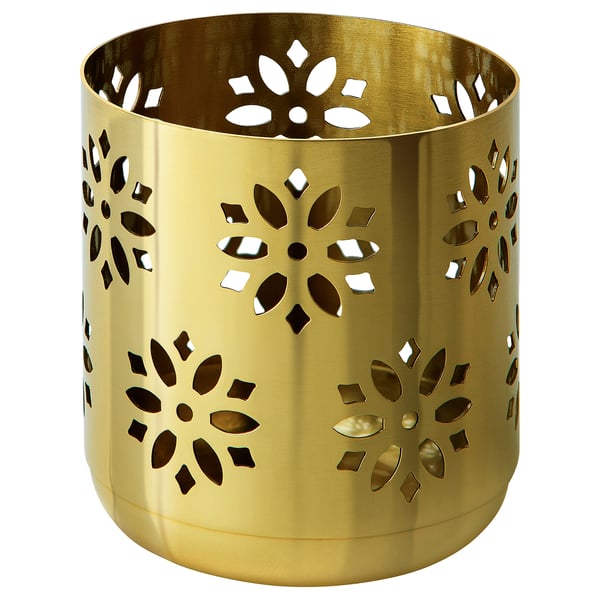 Golden, cylindrical AROMATISK tealight holder with floral cutouts.